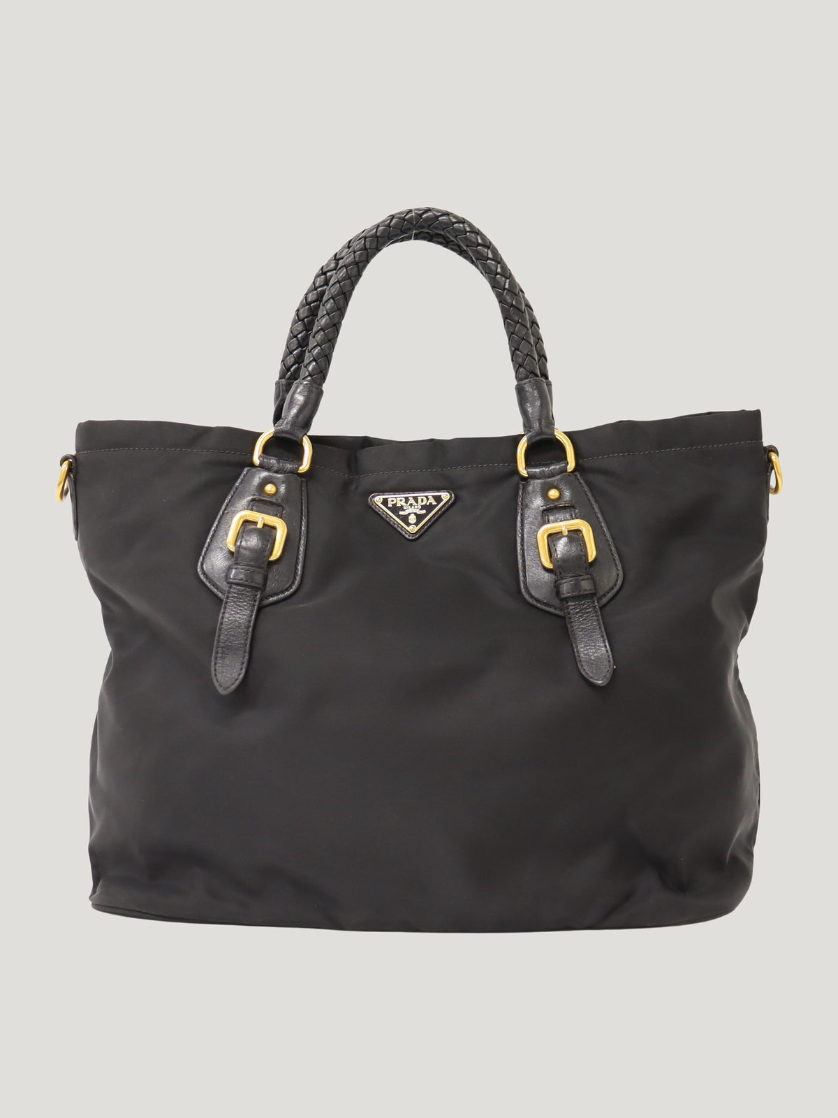 Triangular logo hardware nylon and leather tote bag