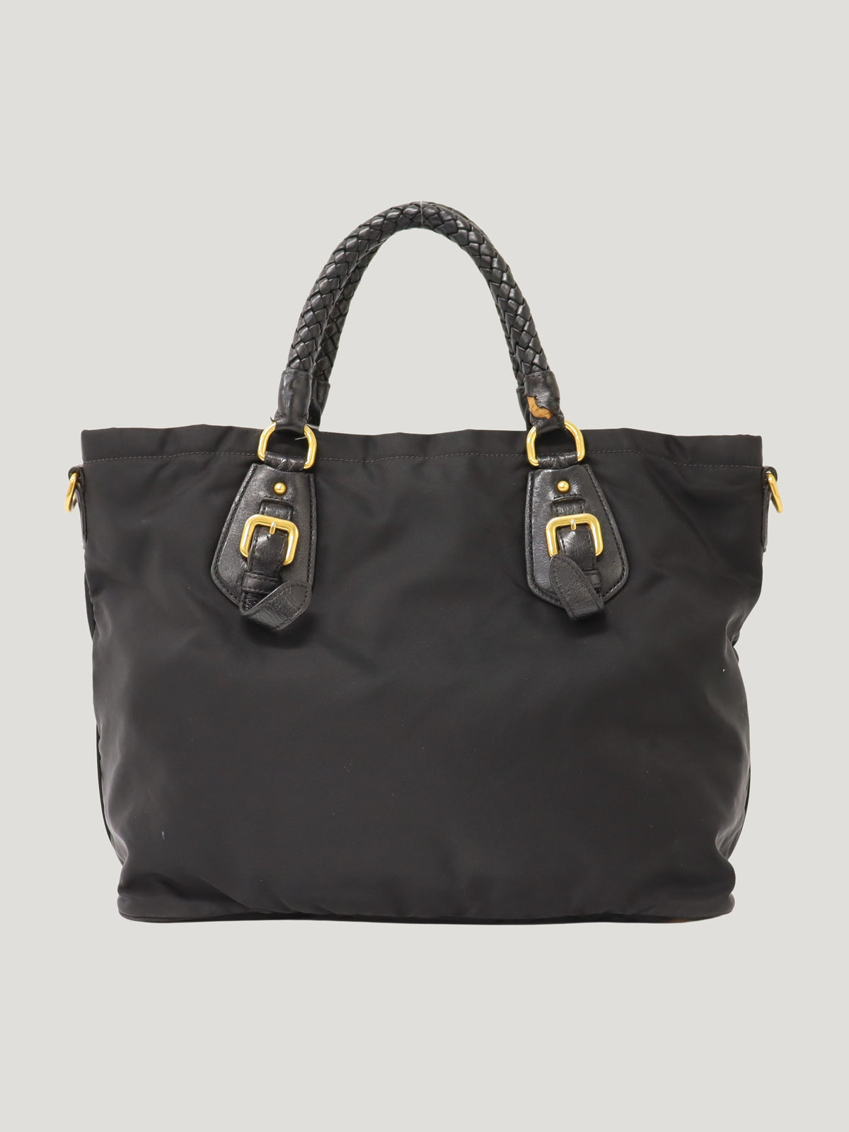 Triangular logo hardware nylon and leather tote bag