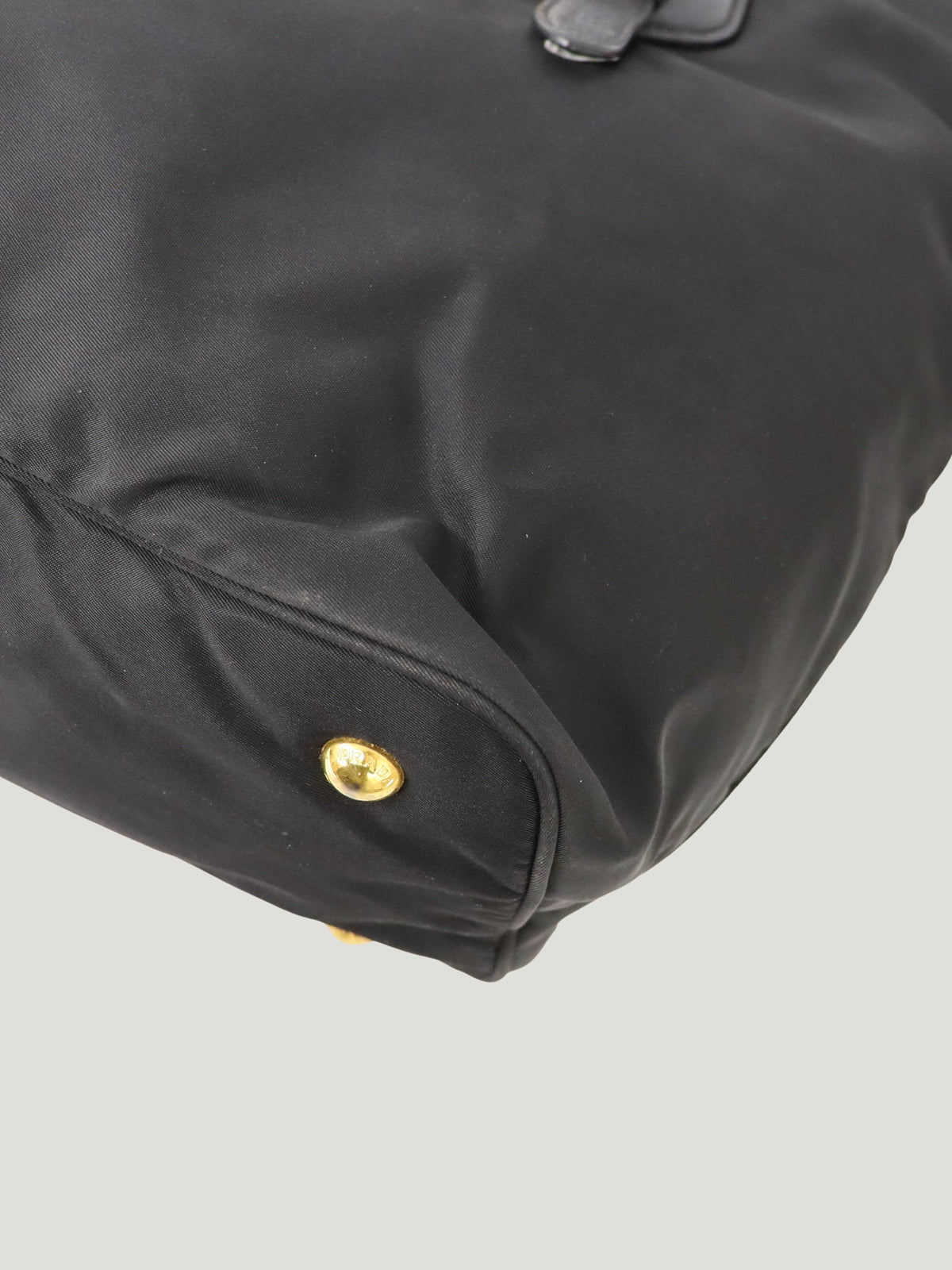 Triangular logo hardware nylon and leather tote bag