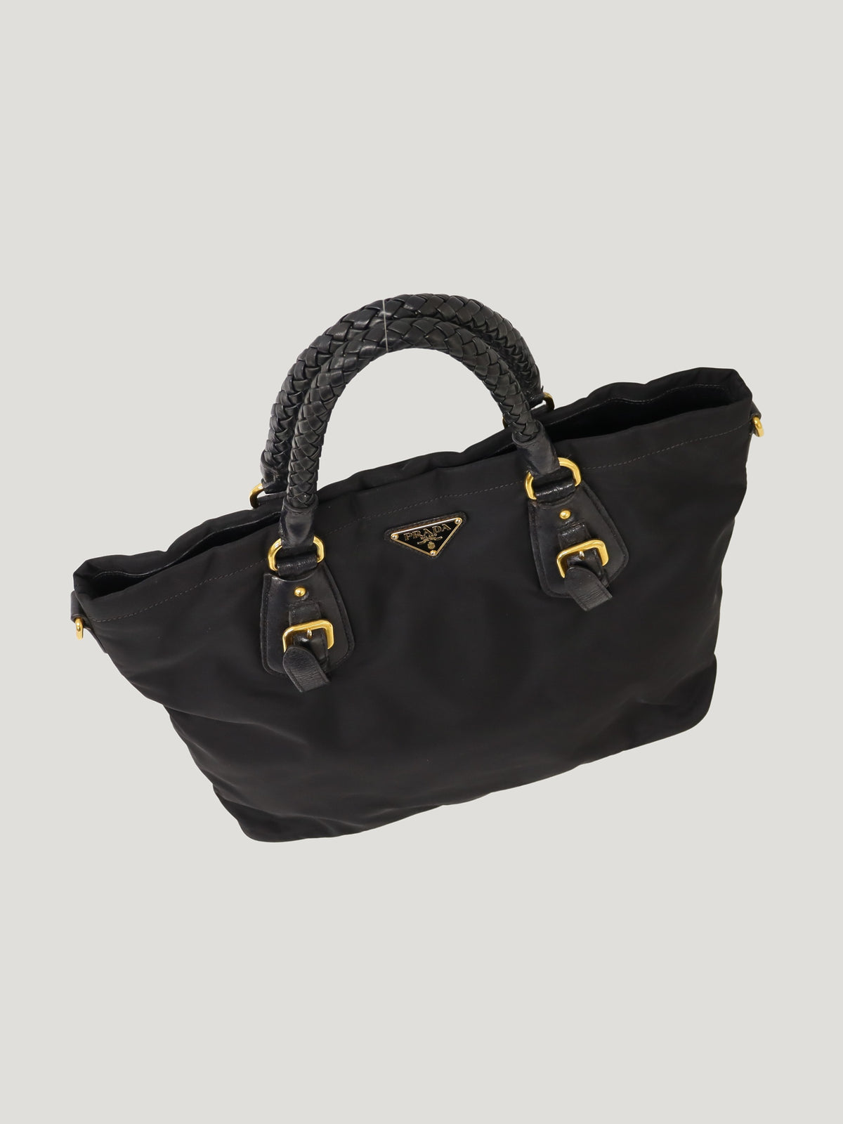 Triangular logo hardware nylon and leather tote bag