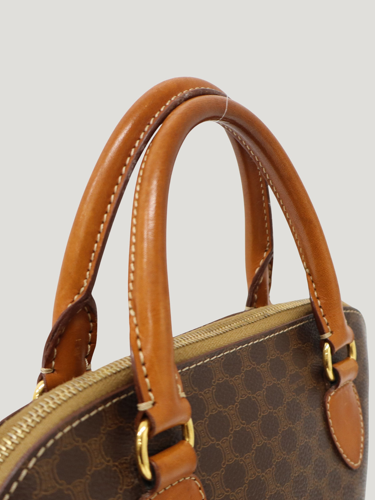Macadam-pattern handbag with embossed blazon