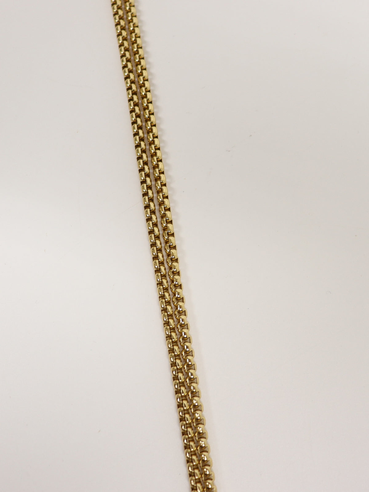 三角ロゴ金具ハラコミニショルダーバッグ　