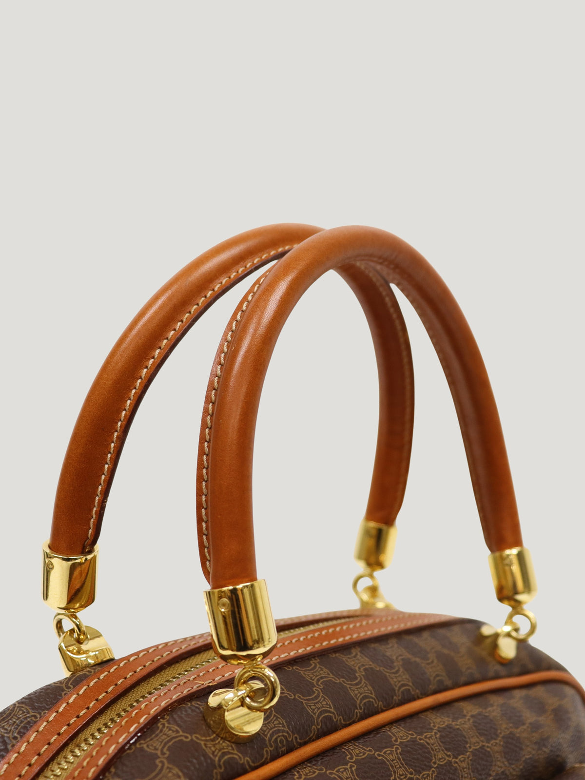 Macadam-pattern handbag with embossed blazon