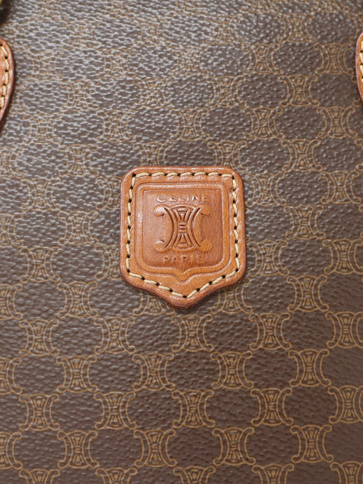 Macadam-pattern handbag with embossed blazon