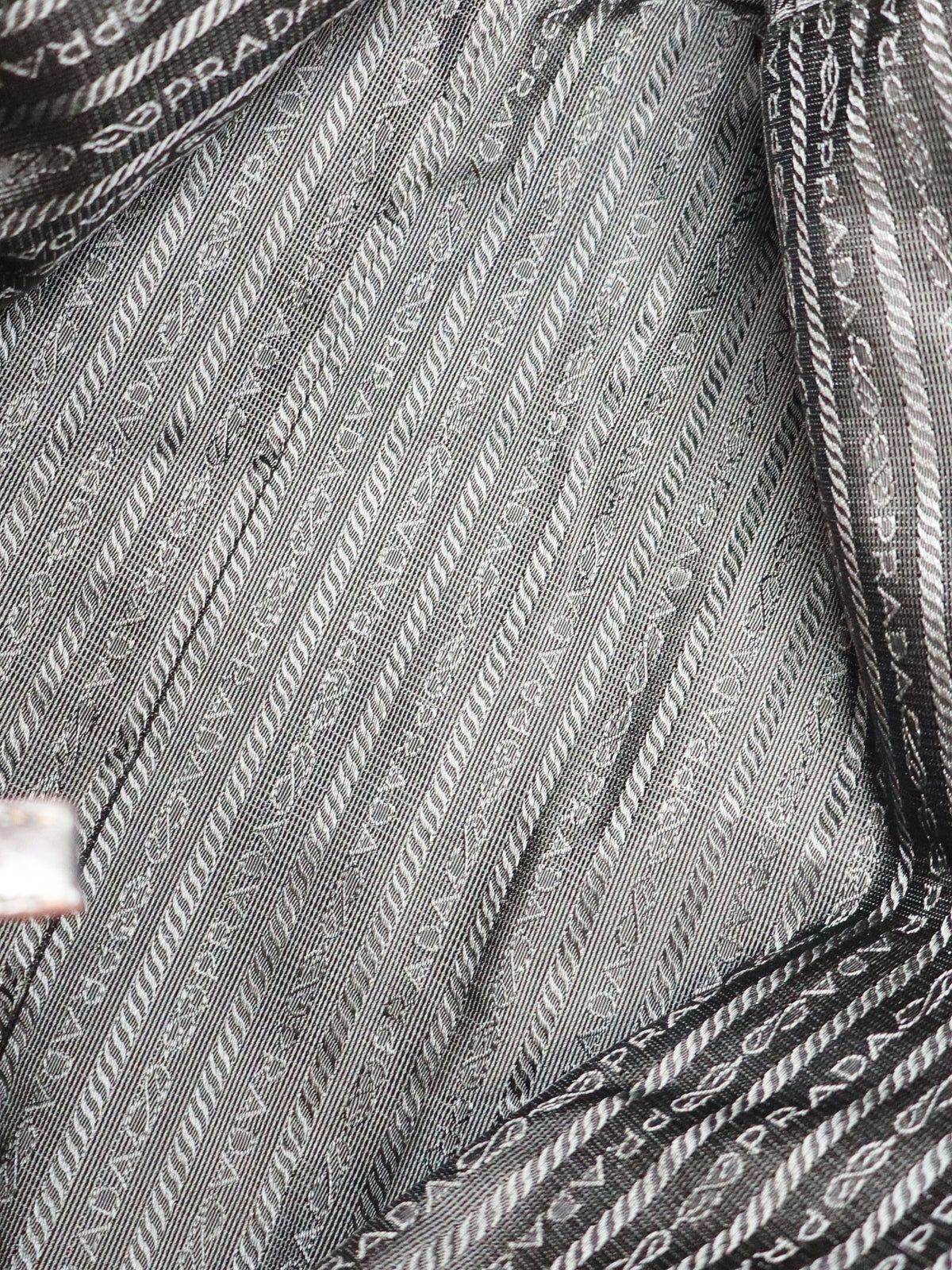 Logo-Embossed Leather Handbag