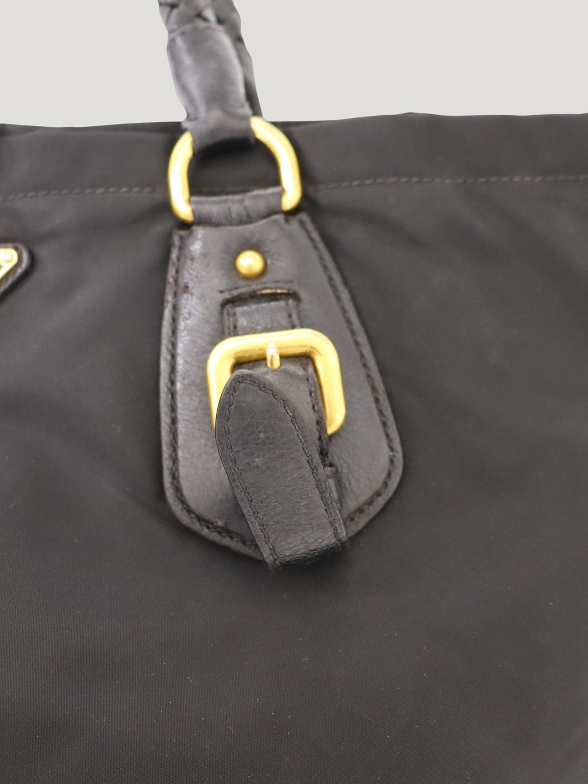 Triangular logo hardware nylon and leather tote bag