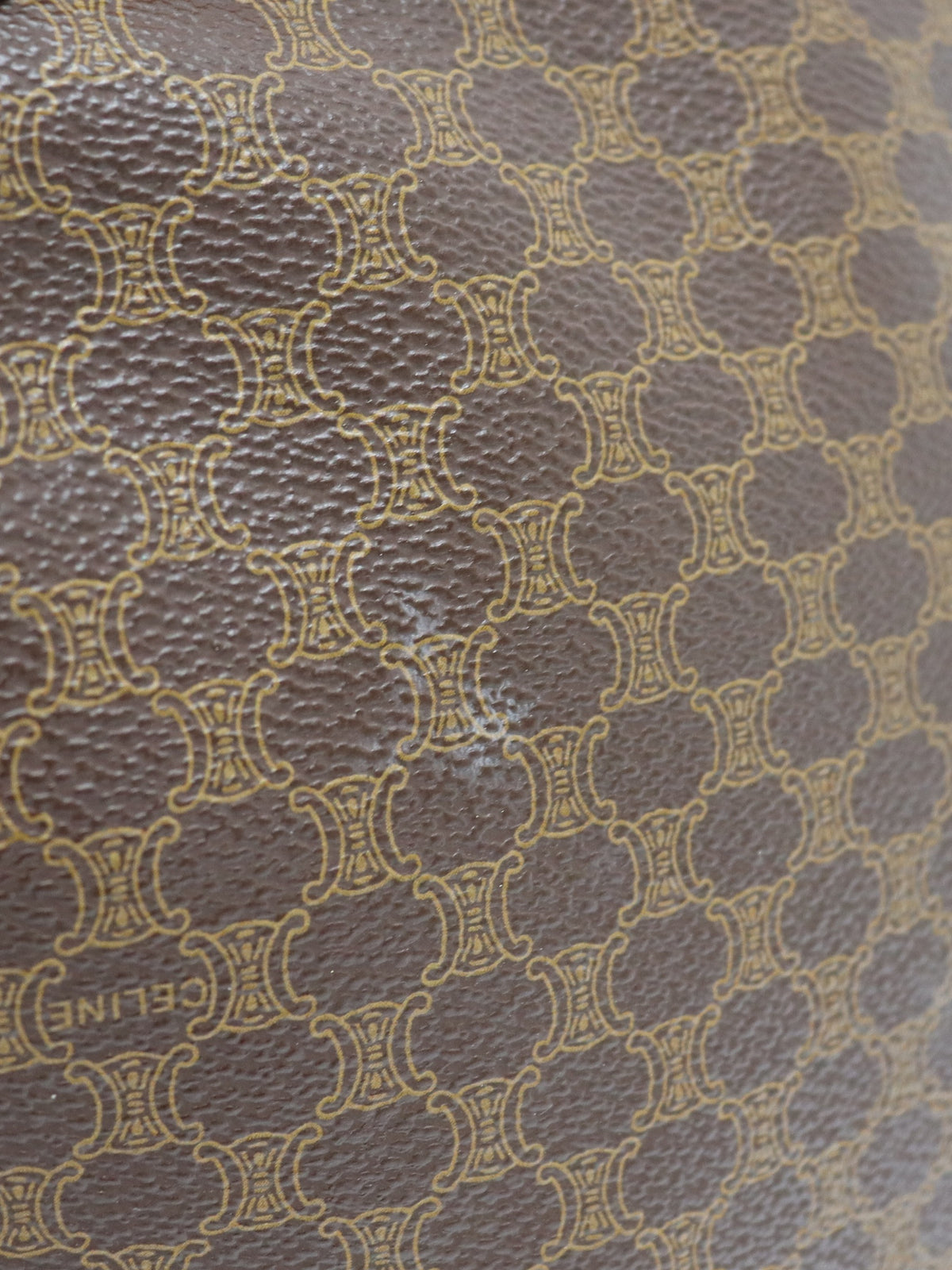 Macadam-pattern handbag with embossed blazon