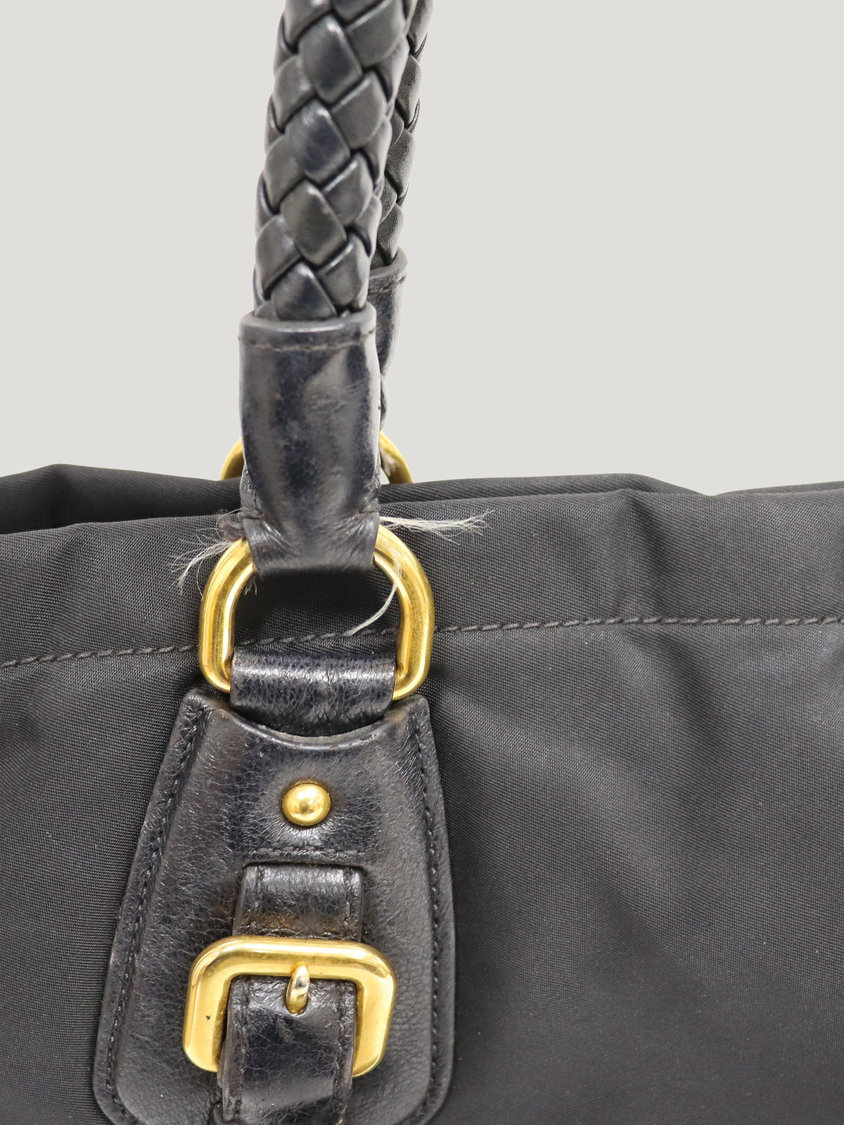 Triangular logo hardware nylon and leather tote bag