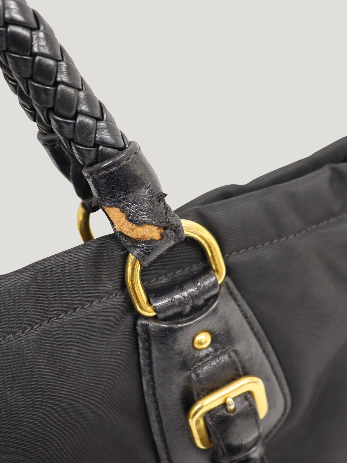 Triangular logo hardware nylon and leather tote bag