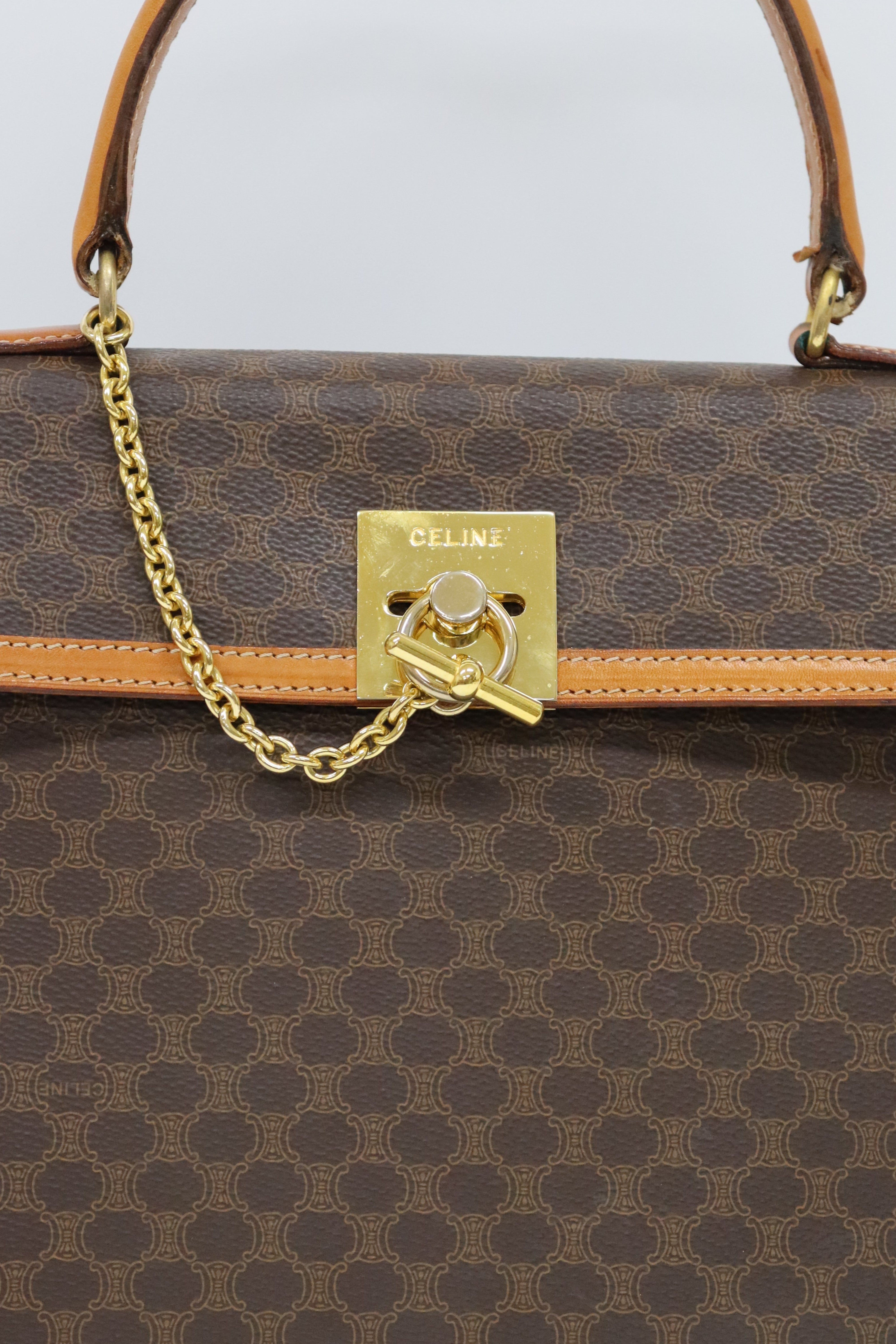 Macadam-patterned Gancini clasp handbag