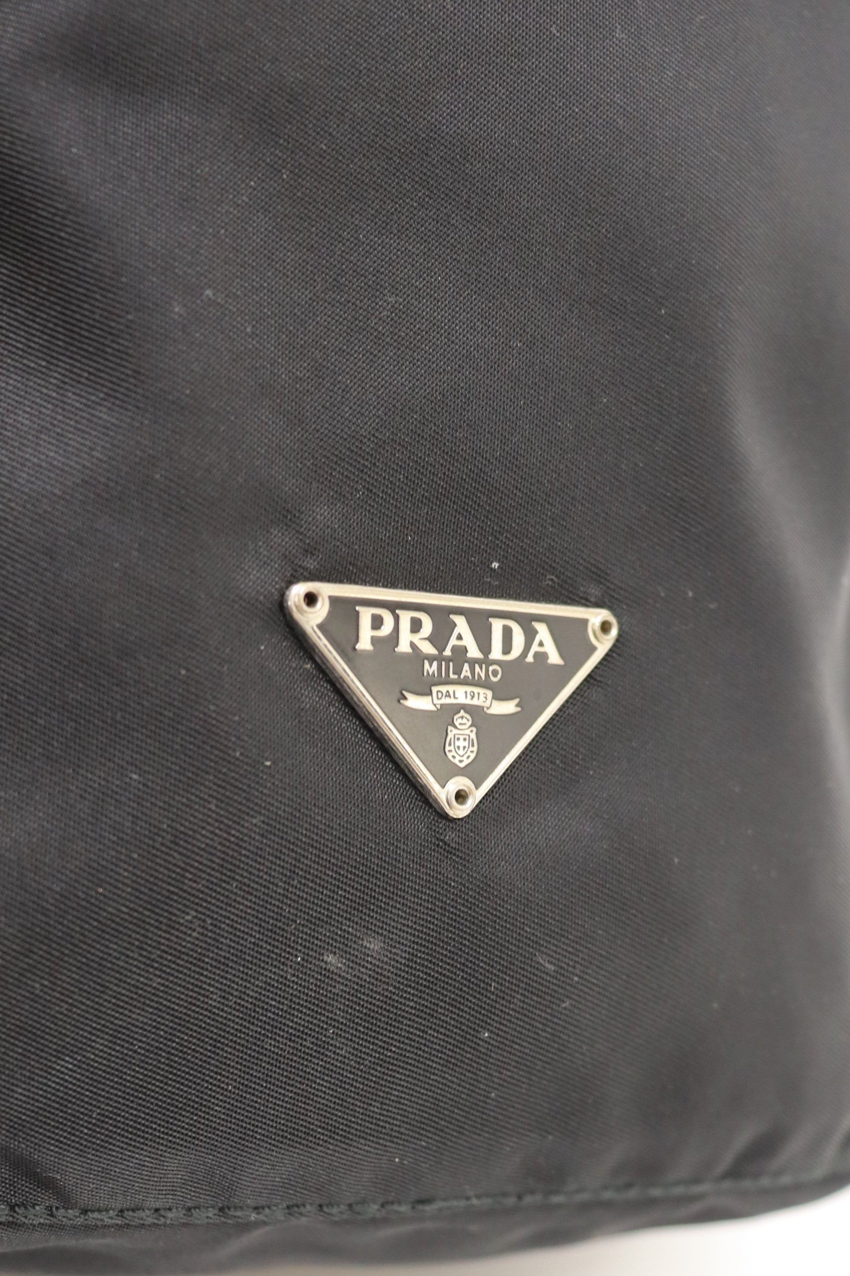 Triangular logo hardware nylon pouch
