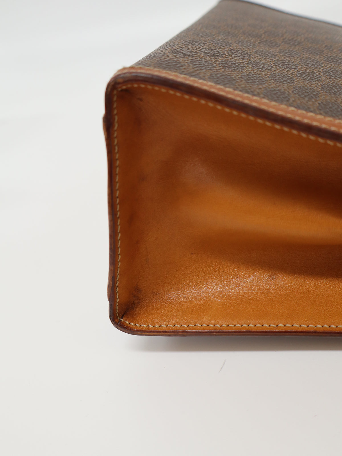 Macadam-patterned Gancini clasp handbag