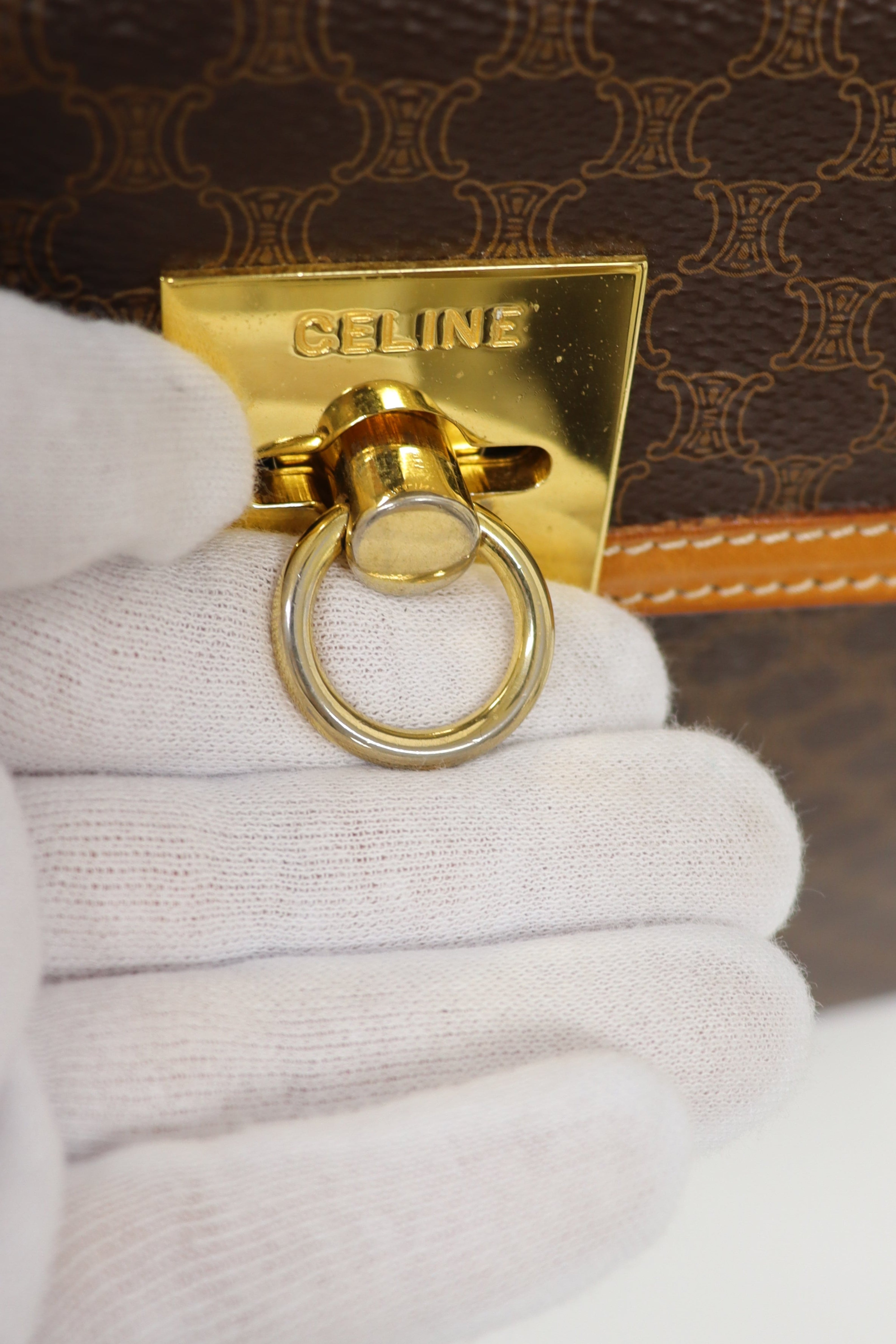 Macadam-patterned Gancini clasp handbag