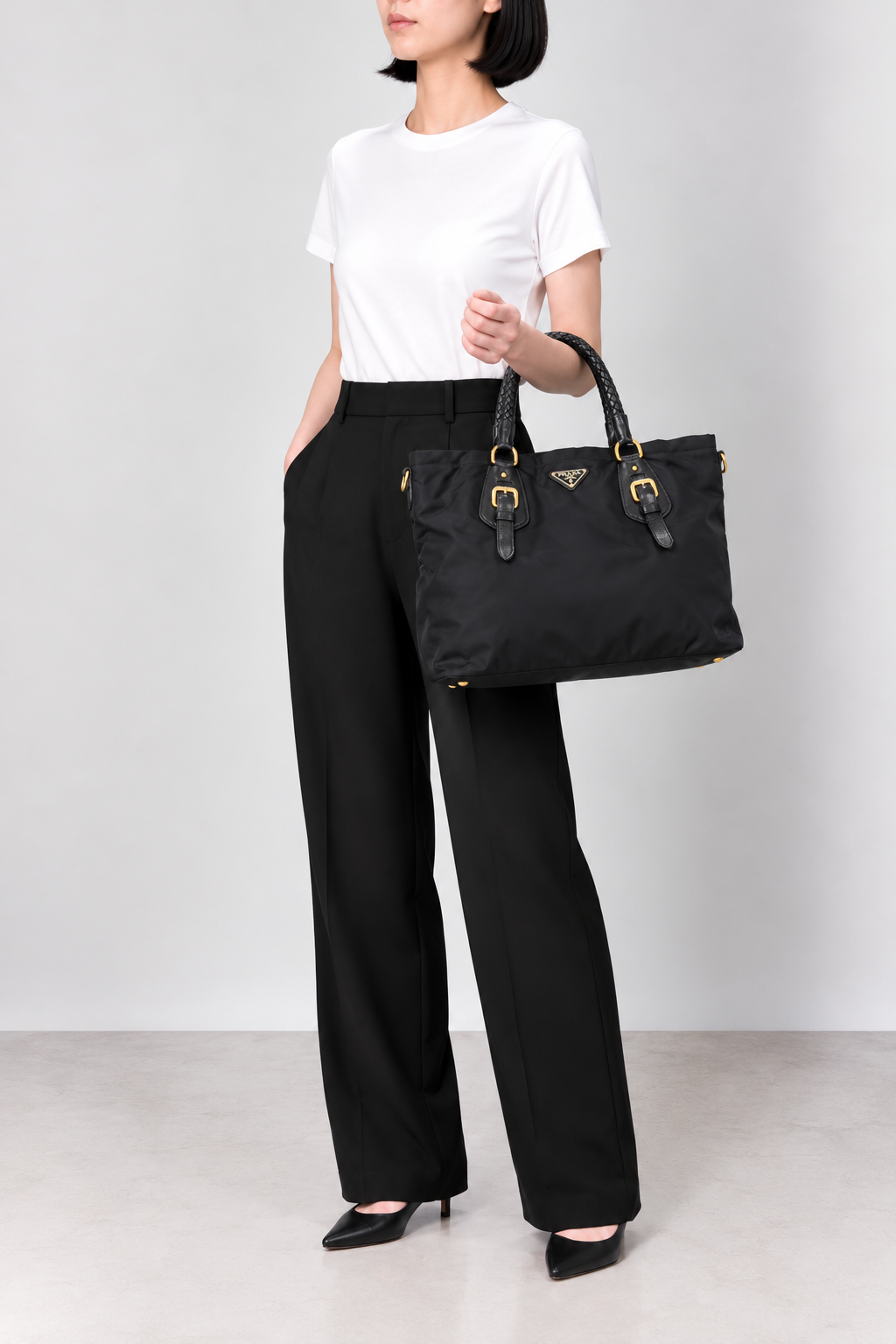 Triangular logo hardware nylon and leather tote bag
