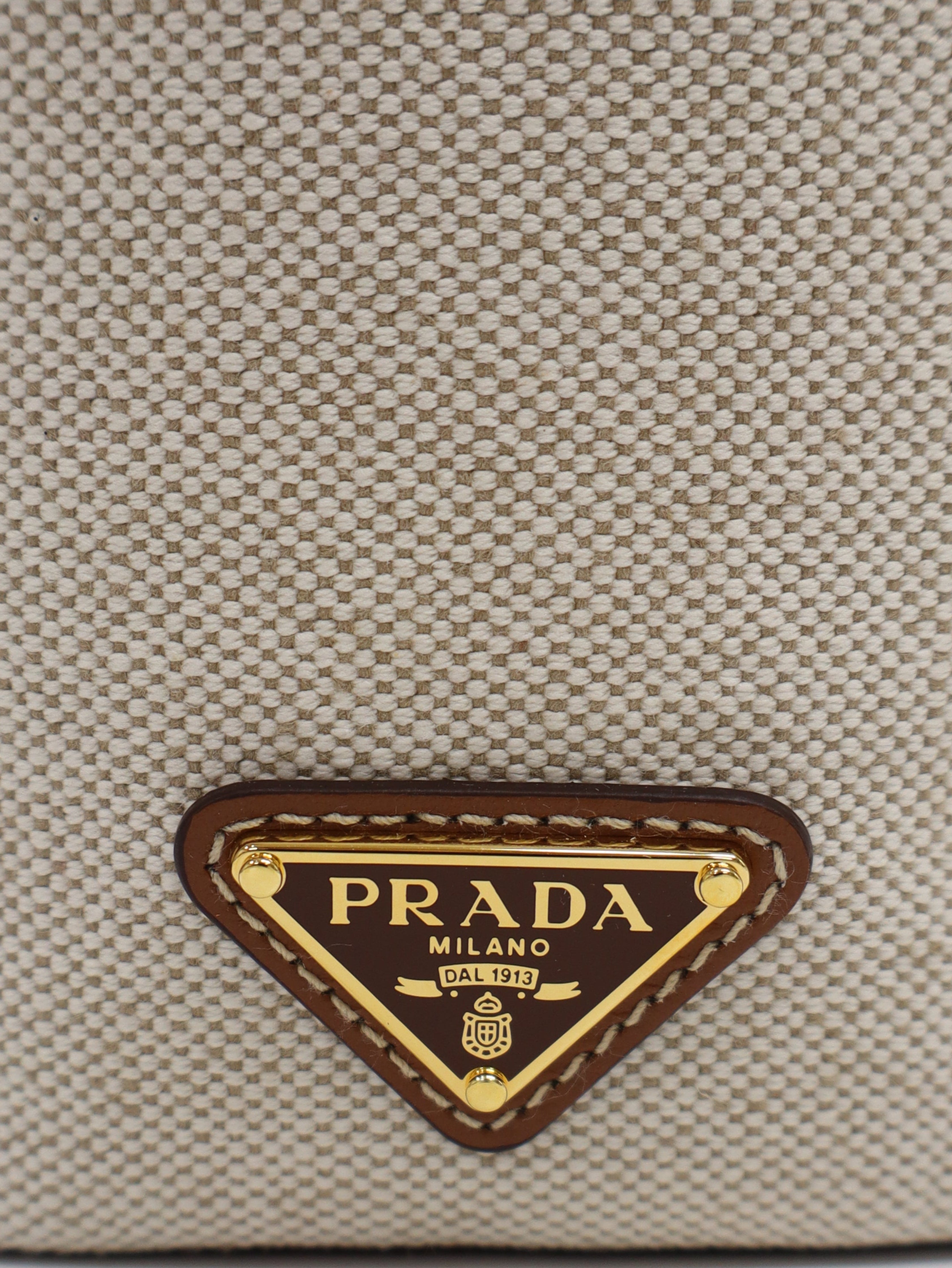 三角ロゴ金具キャンバス巾着ポーチ – Hedy