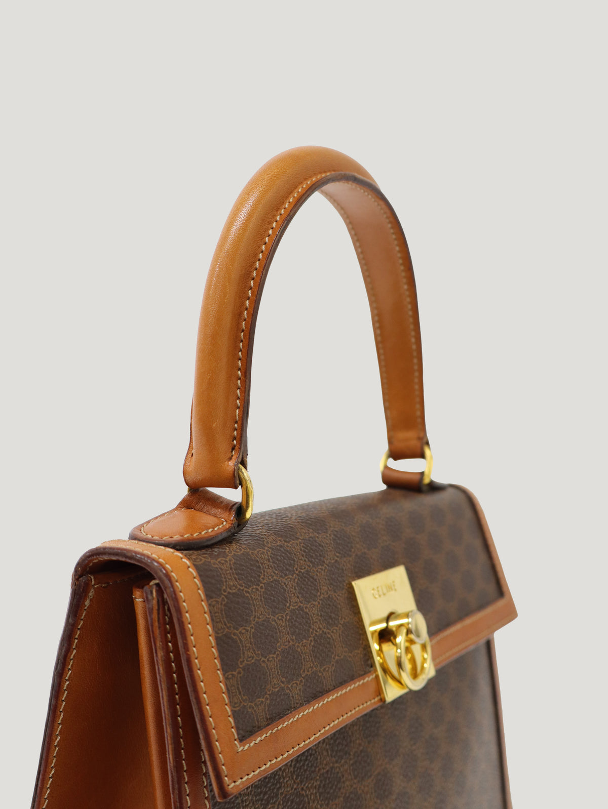 Macadam-patterned Gancini clasp handbag