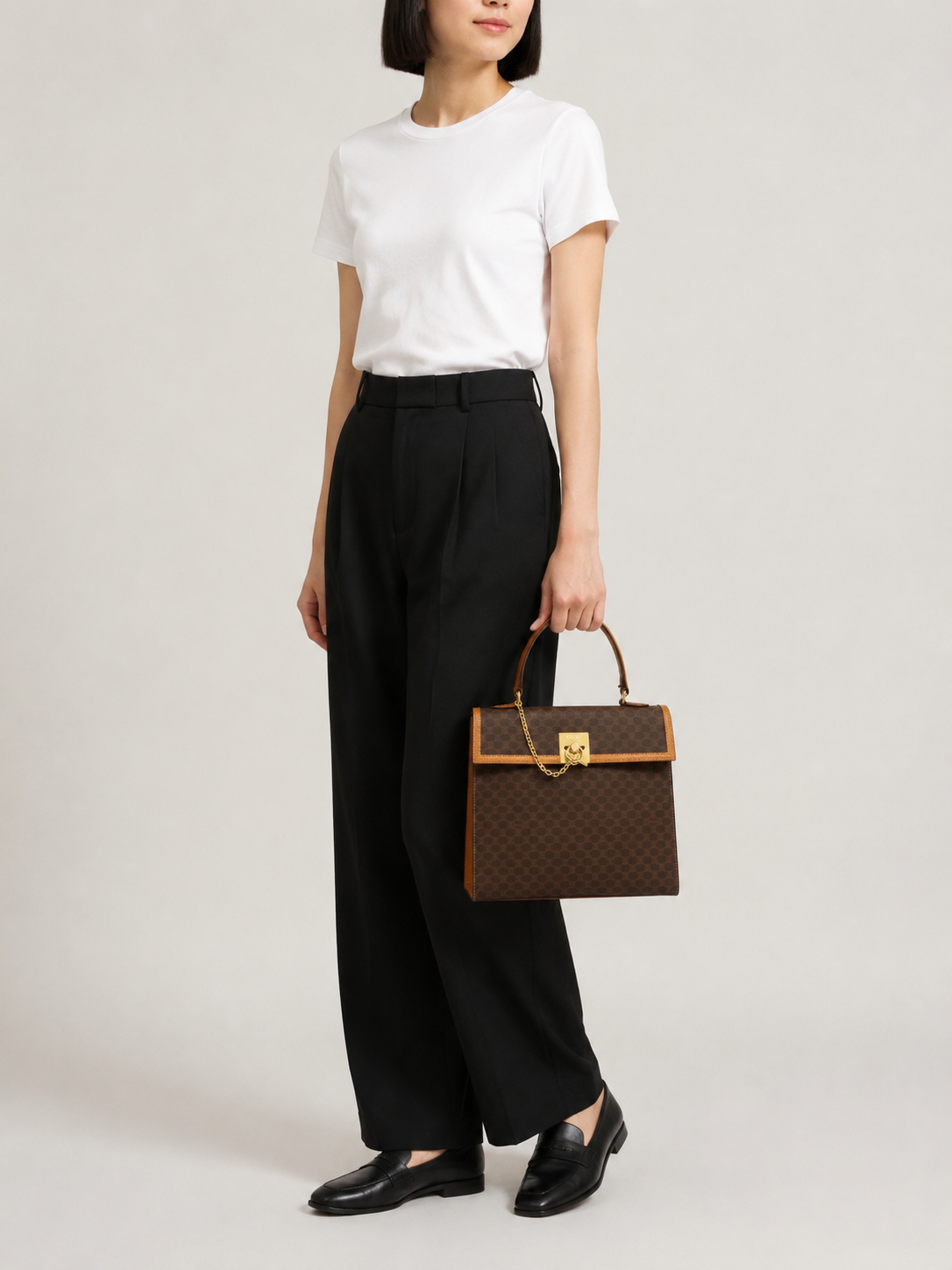 Macadam-patterned Gancini clasp handbag