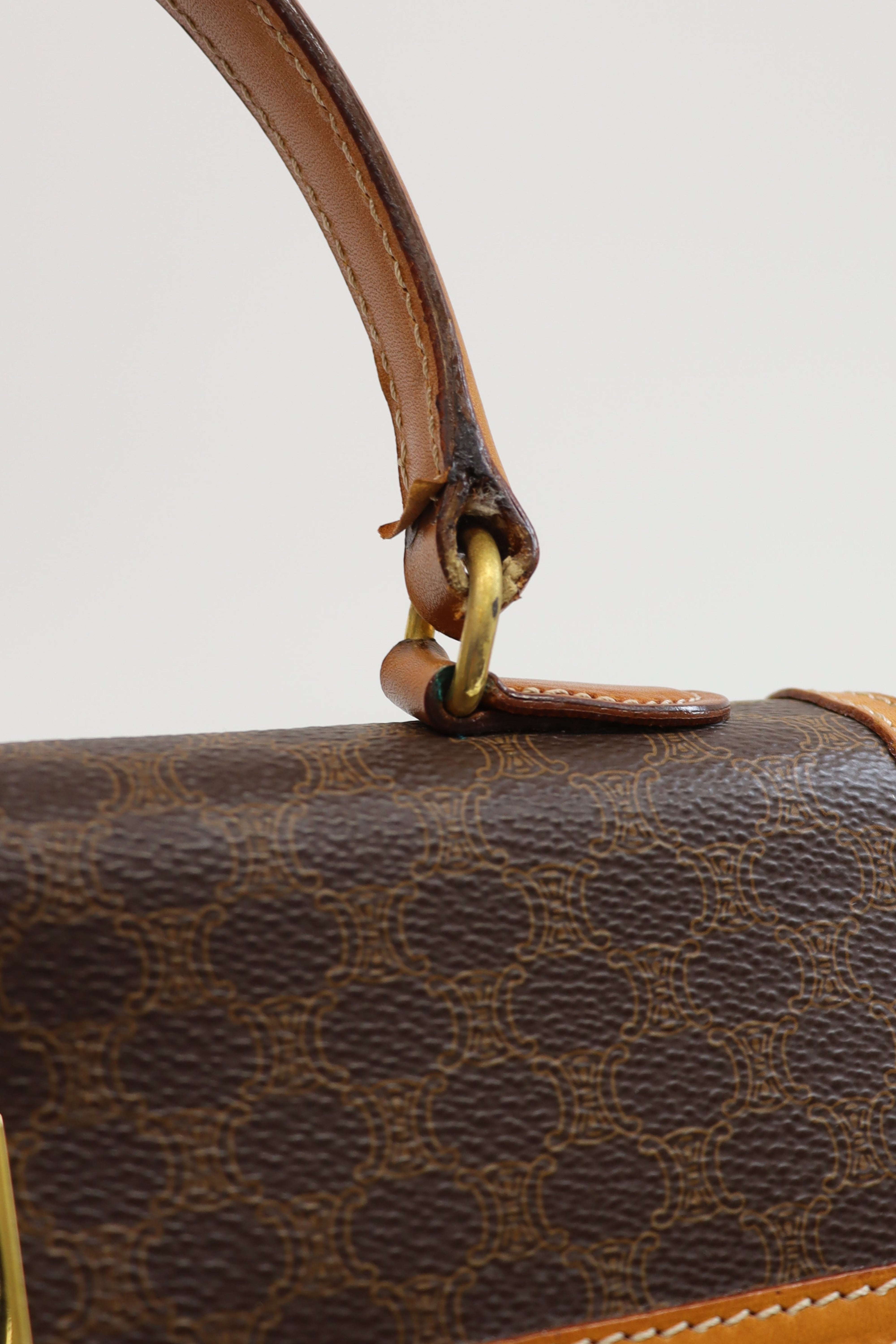 Macadam-patterned Gancini clasp handbag