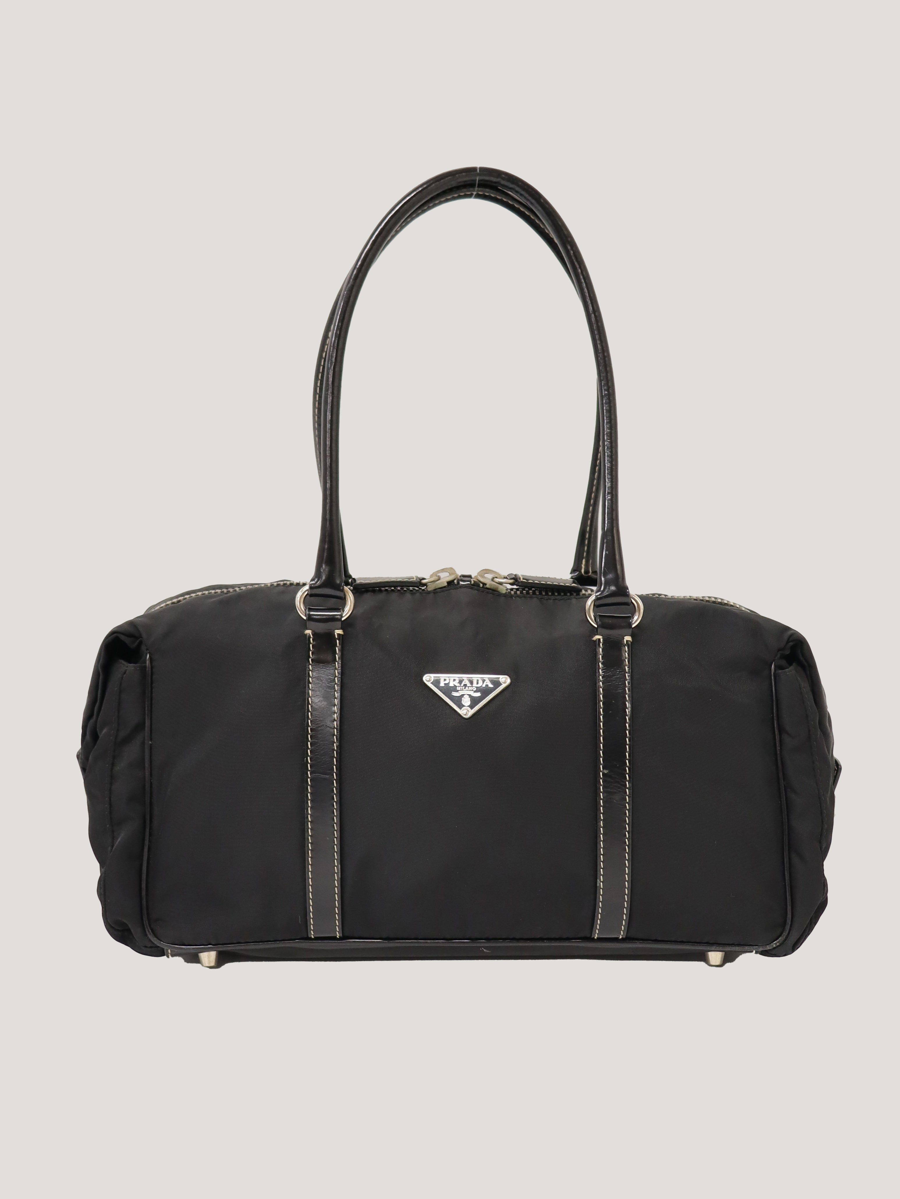 三角ロゴ金具ナイロンレザーハンドバッグ – Hedy