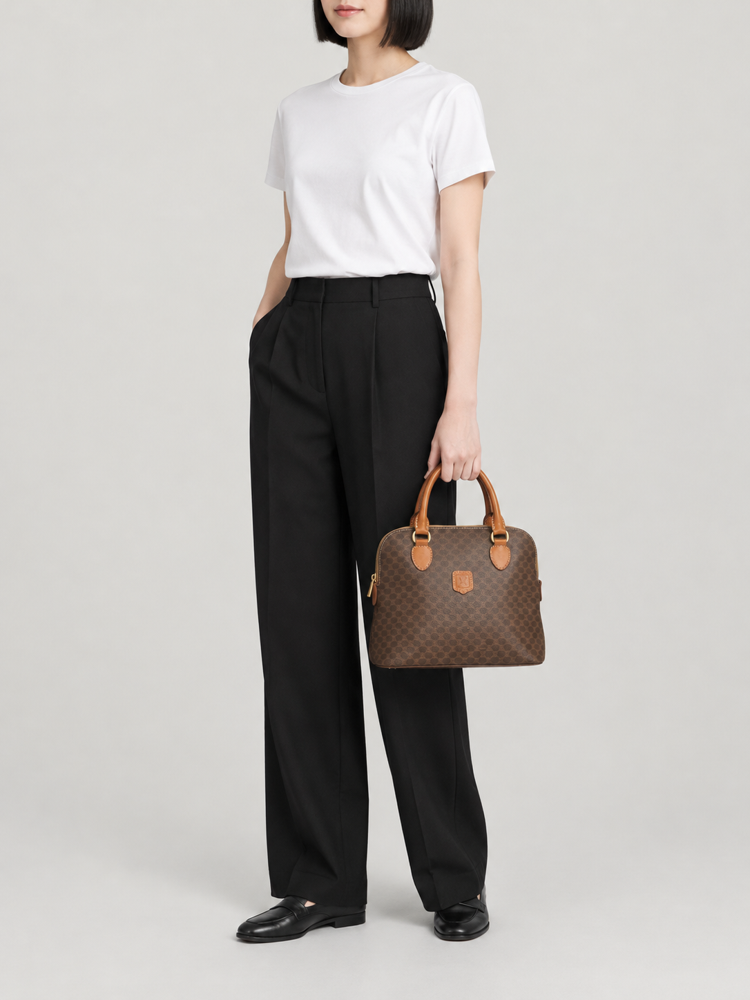 Macadam-pattern handbag with embossed blazon